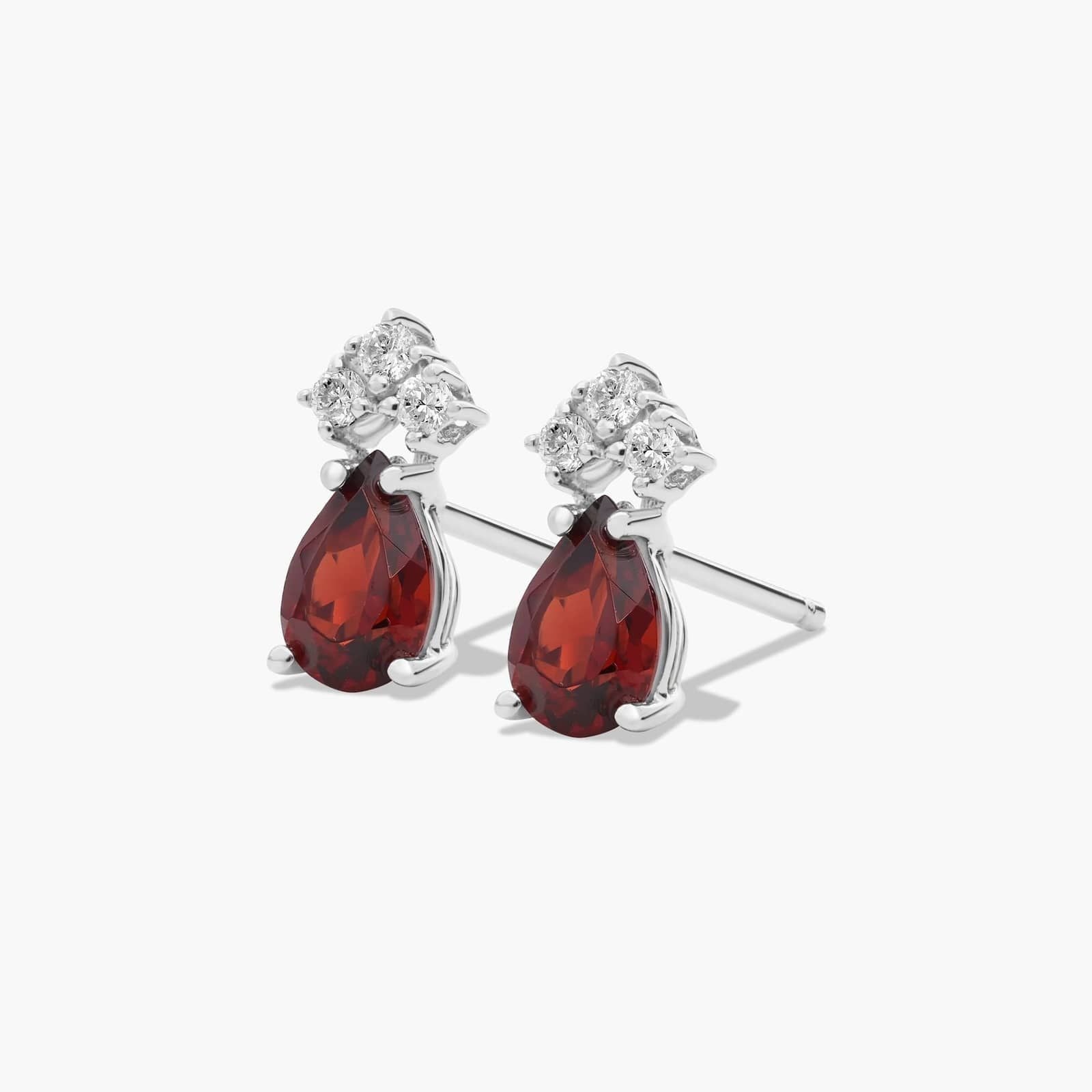 Pear Shape Garnet And Tri-Diamond Stud Earrings