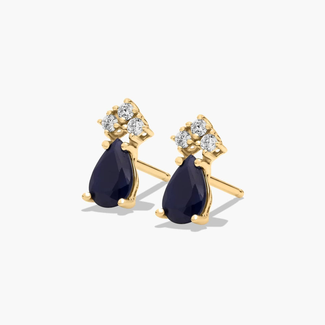 Pear Shape Sapphire And Tri-Diamond Stud Earrings