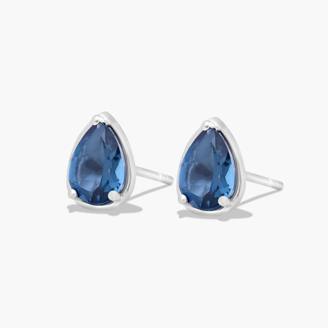 Radiant Reflections Pear Shape Blue Topaz Stud Earrings In 14K White Gold