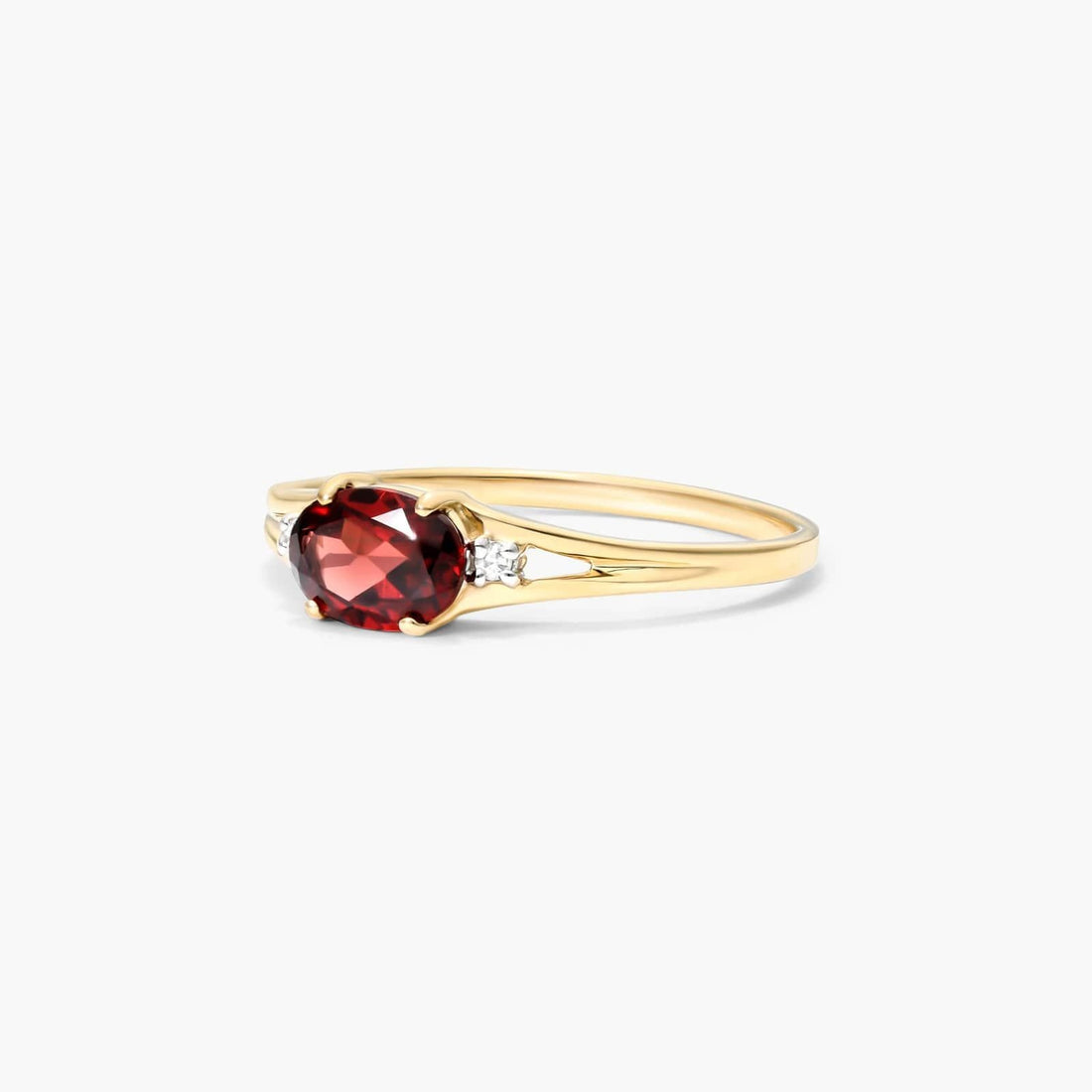 Oval Garnet And Diamond Accent Birthstone Ring In 14K Yellow Gold