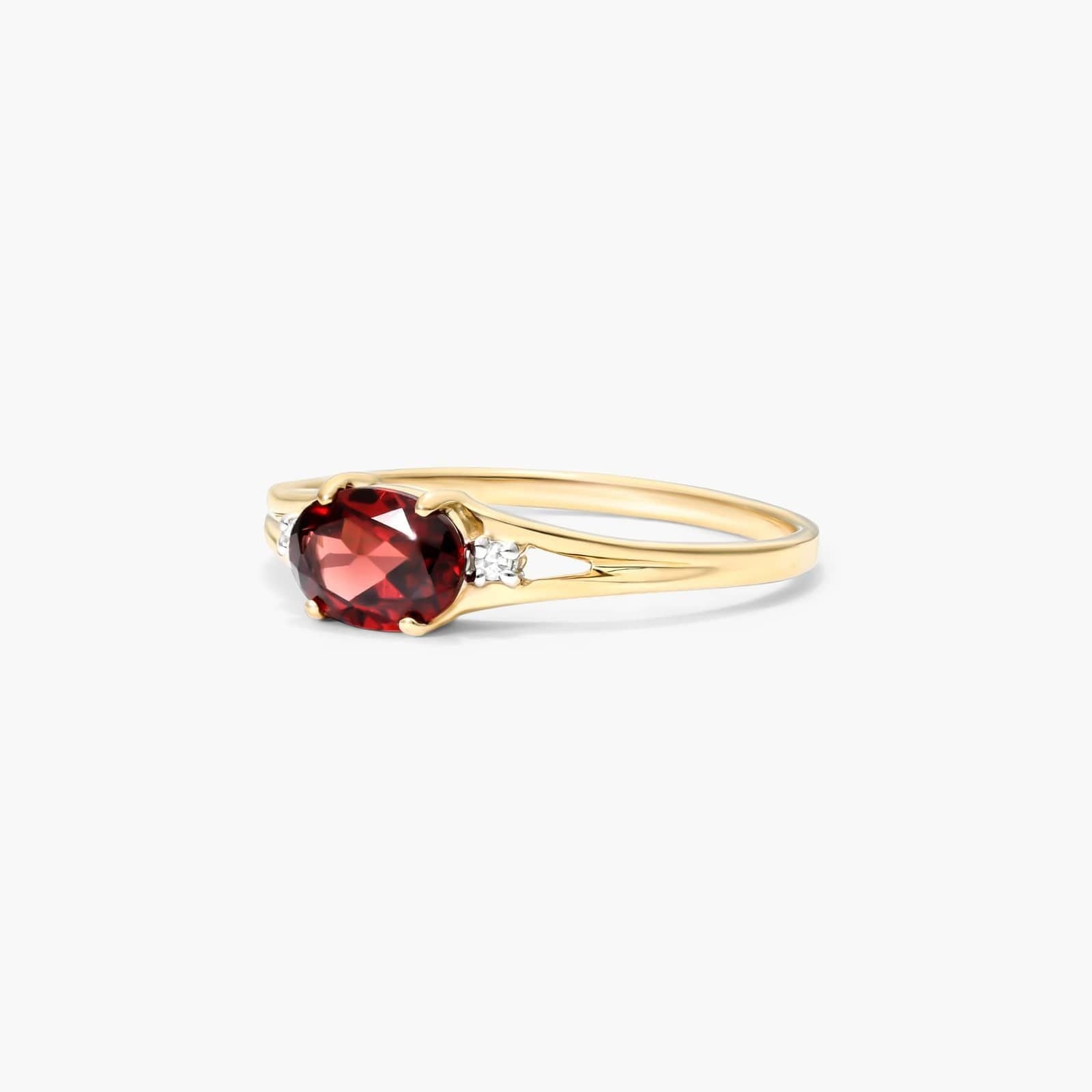 Oval Garnet And Diamond Accent Birthstone Ring In 14K Yellow Gold