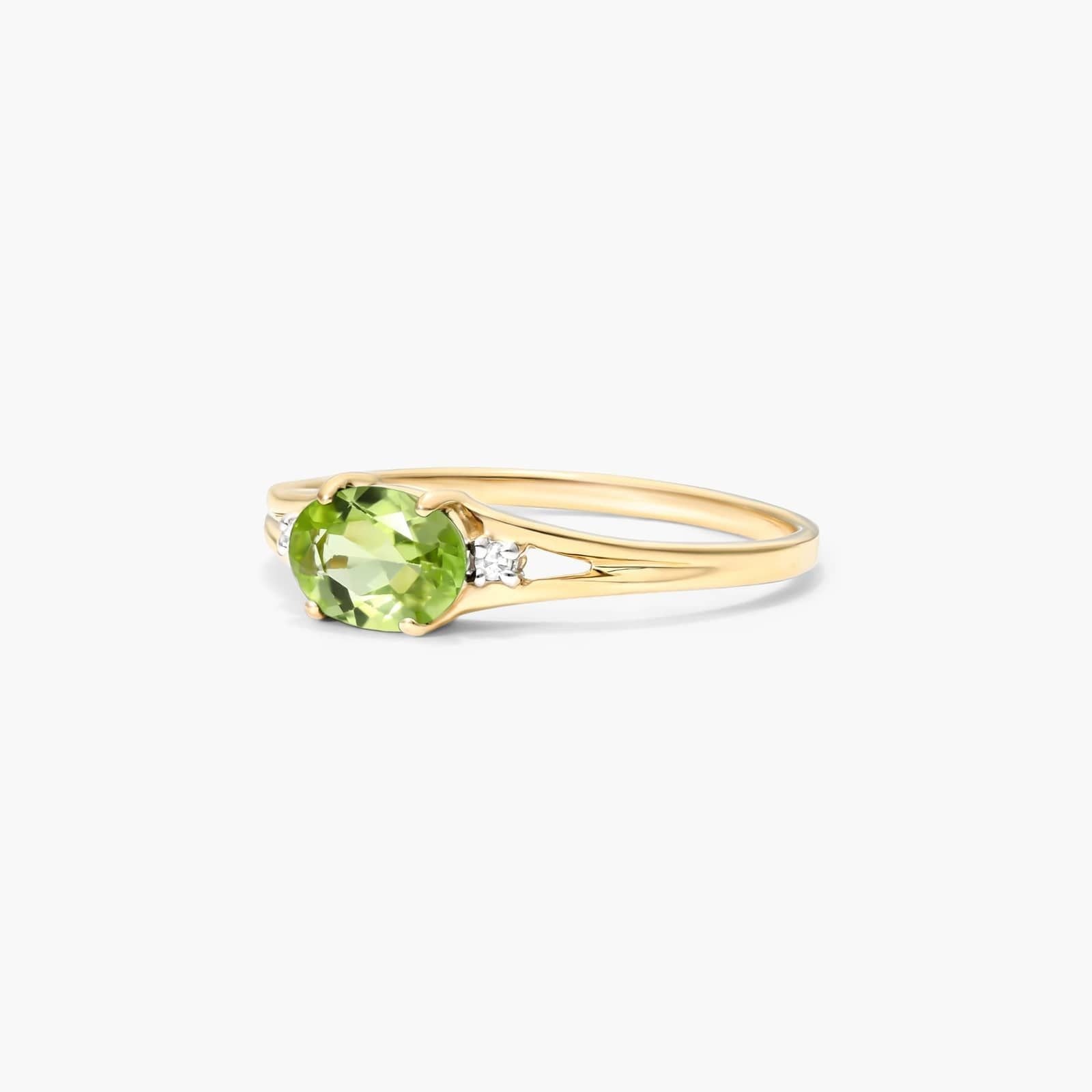 Oval Peridot And Diamond Accent Birthstone Ring In 14K Yellow Gold