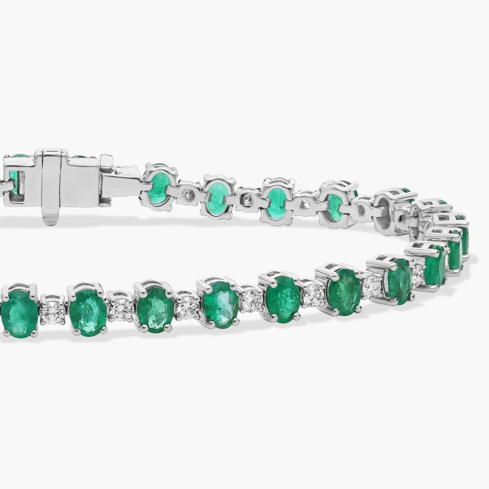 Alternating Diamond and Oval Emerald Tennis Bracelet in 14K White Gold