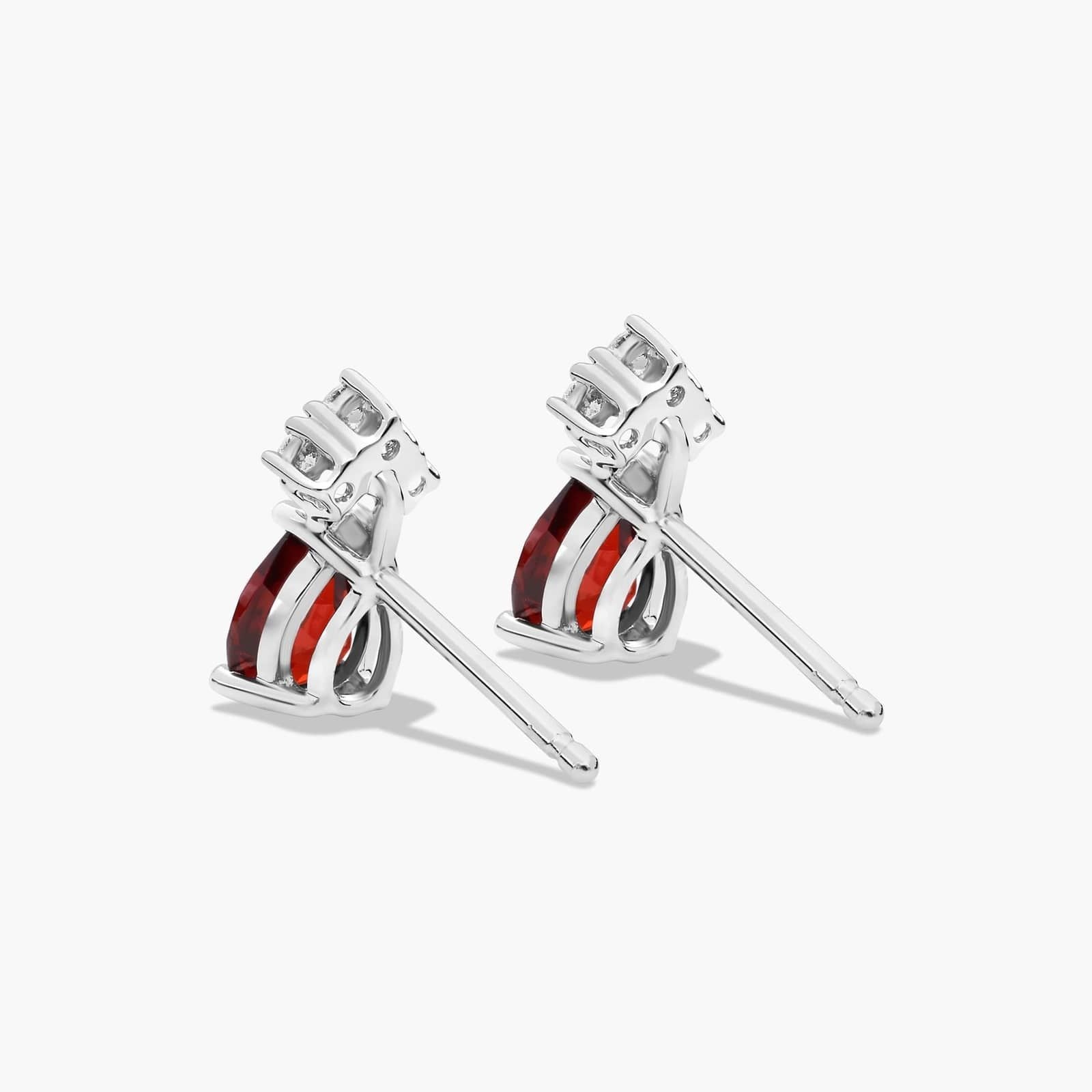 Pear Shape Garnet And Tri-Diamond Stud Earrings