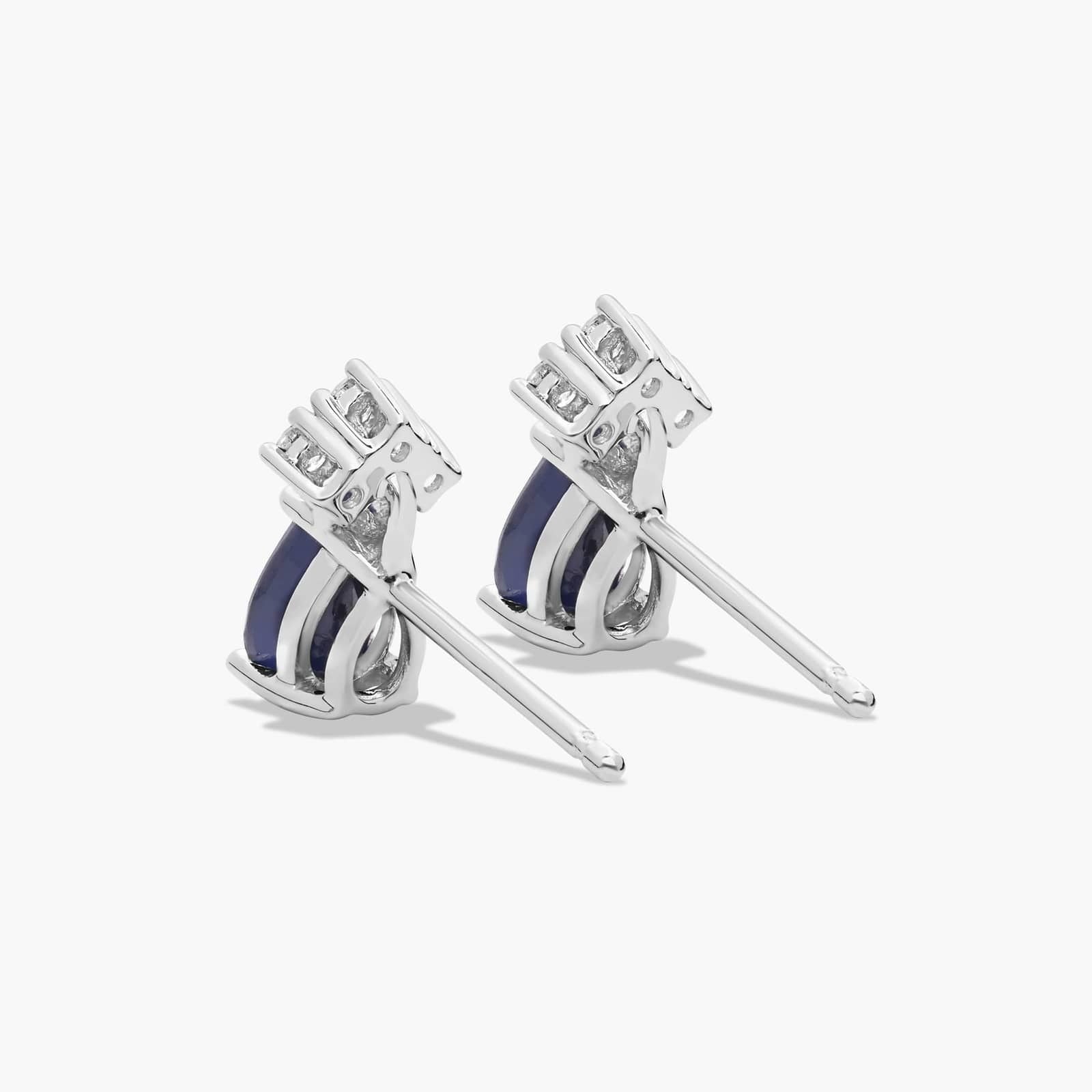 Pear Shape Sapphire And Tri-Diamond Stud Earrings
