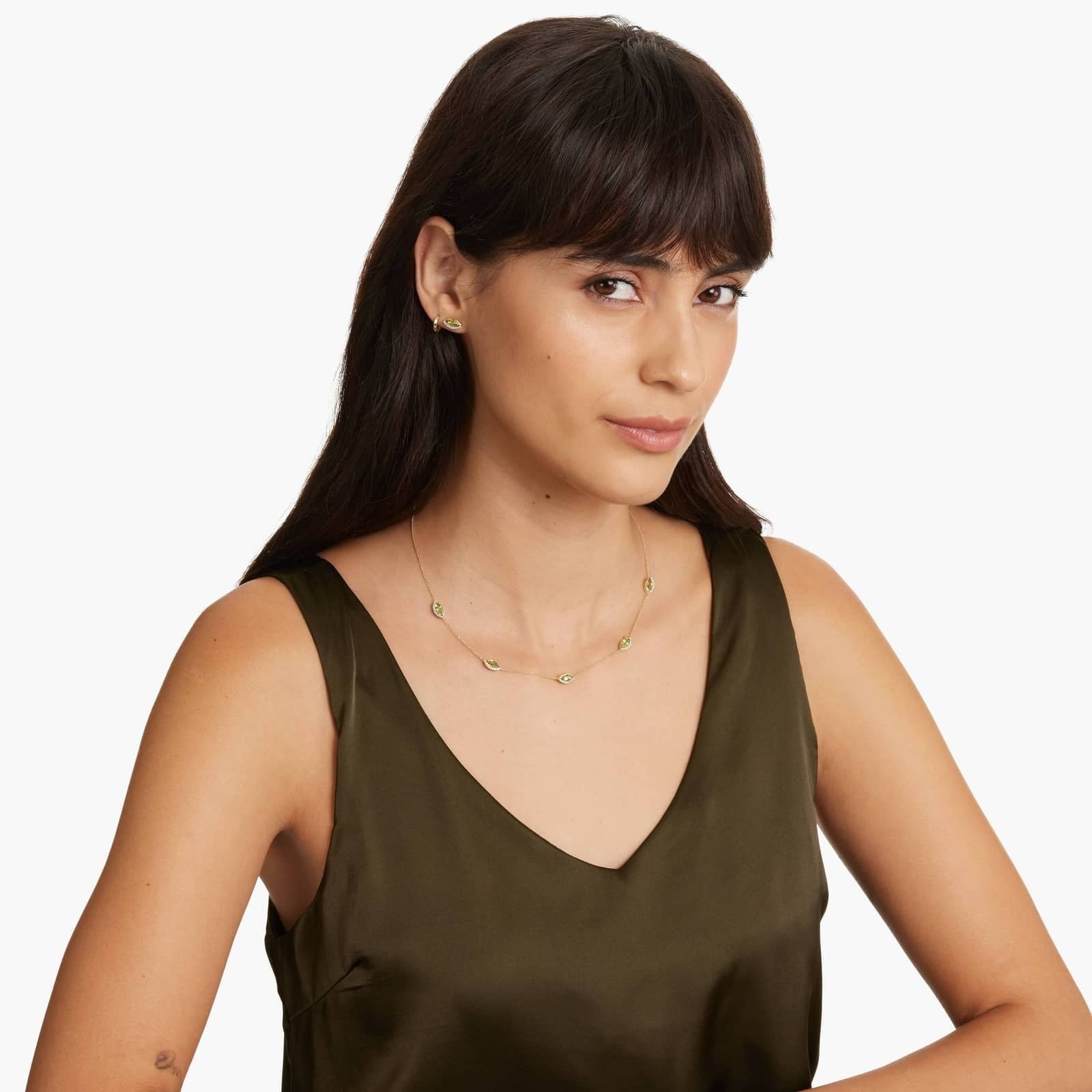 Radiant Reflections Marquise Cut Peridot Earrings In 14K Yellow Gold