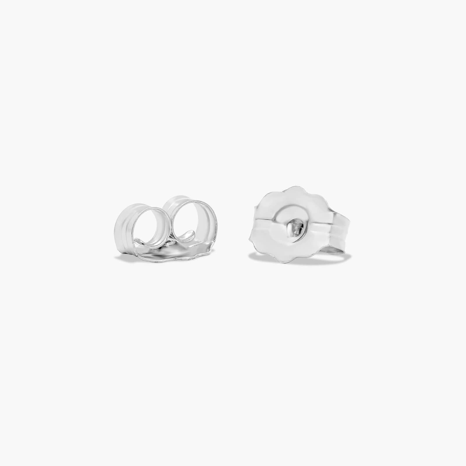 Pear Shape Sapphire And Tri-Diamond Stud Earrings