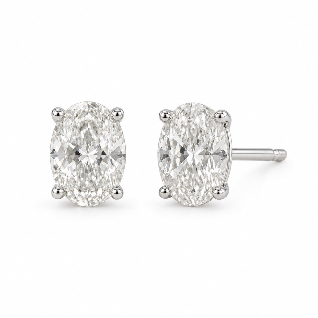 Oval 1.00 CTW lab-grown diamond stud earrings in 14K white gold, front and side views