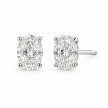 Oval 1.00 CTW lab-grown diamond stud earrings in 14K white gold, front and side views