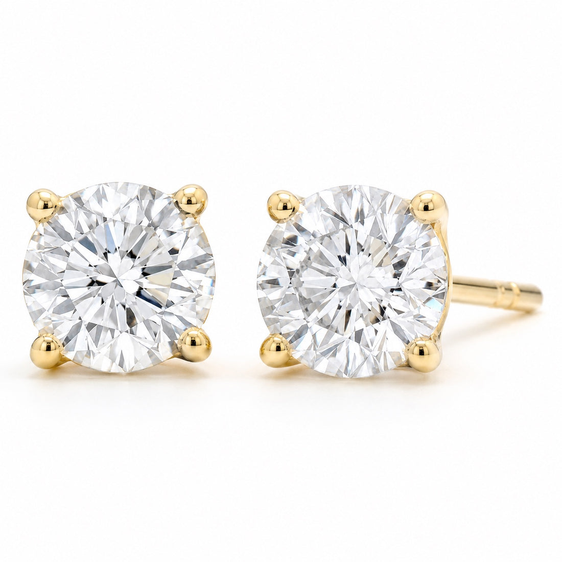 Round 1.50 CTW lab-grown diamond stud earrings in 14K yellow gold, front and side views