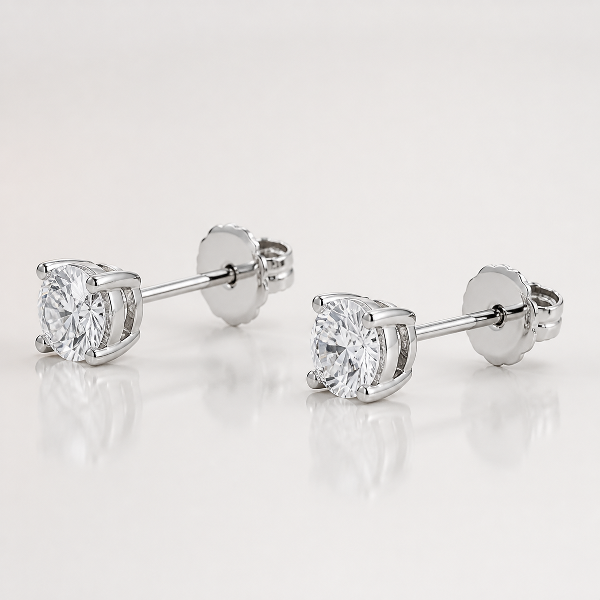 Side view of lab-grown diamond stud earrings in 14K white gold
